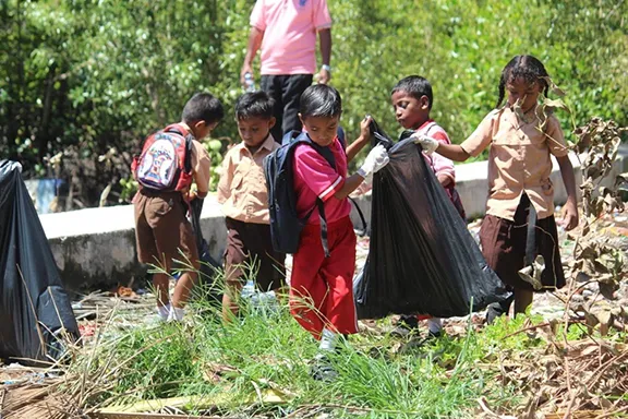 Children picking up litter